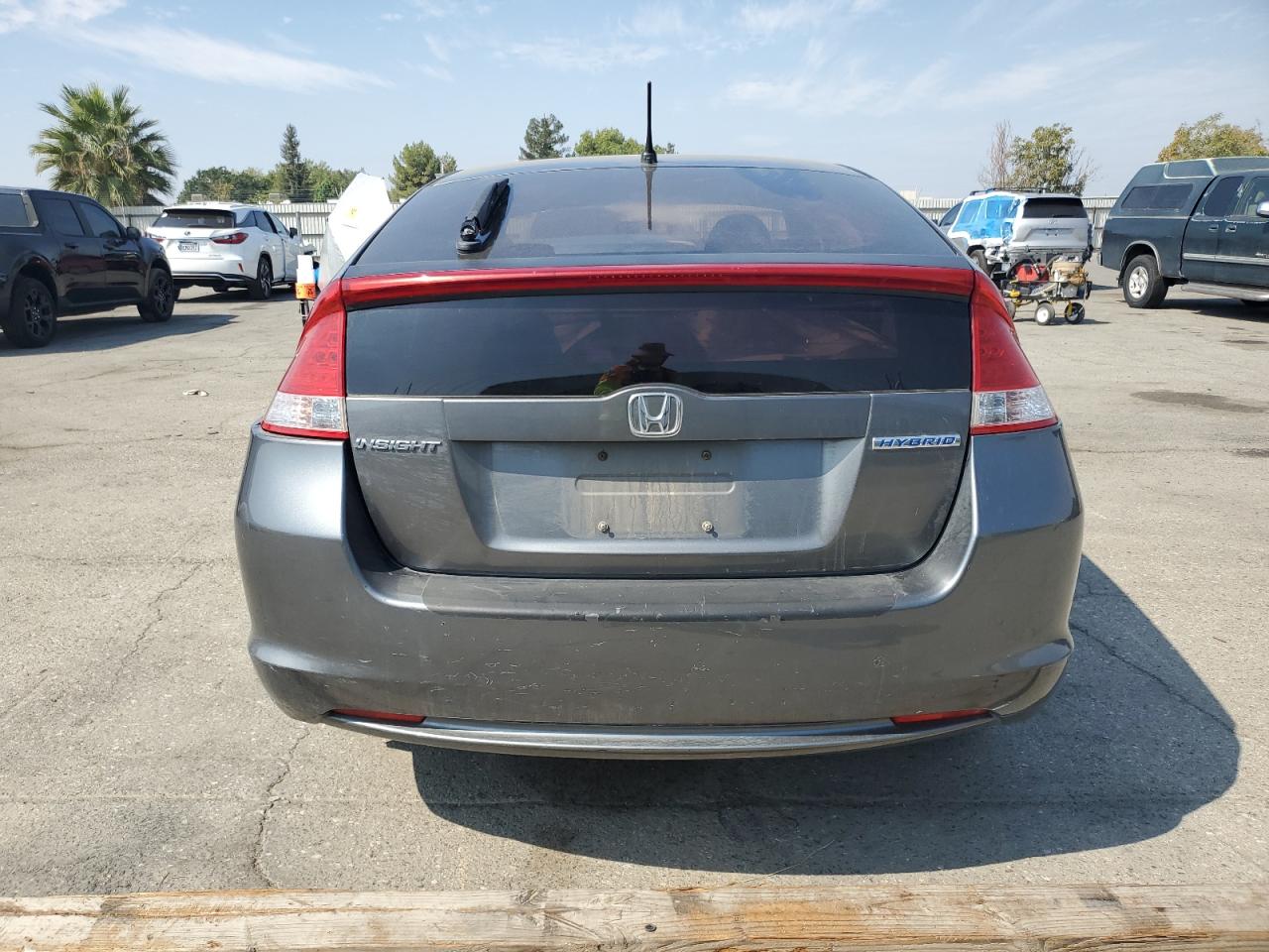 2010 Honda Insight Ex VIN: JHMZE2H76AS004824 Lot: 84629515