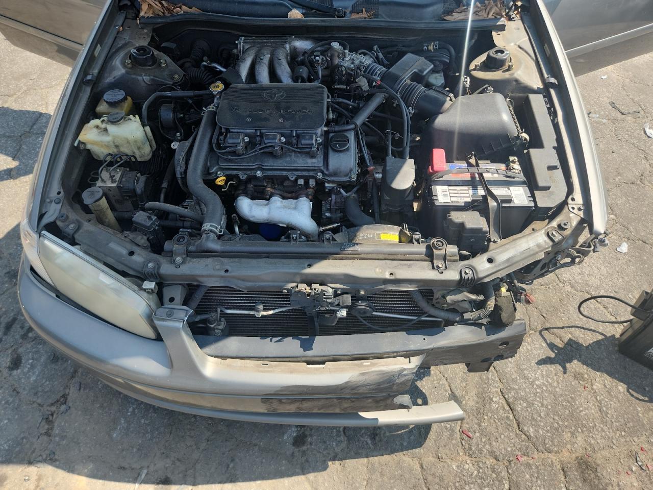 2000 Toyota Camry Le VIN: 4T1BF28K1YU094592 Lot: 81153845