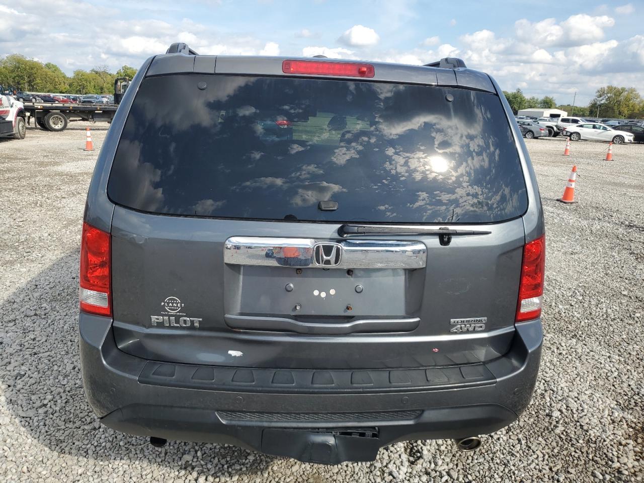 2012 Honda Pilot Touring VIN: 5FNYF4H96CB077859 Lot: 83977205