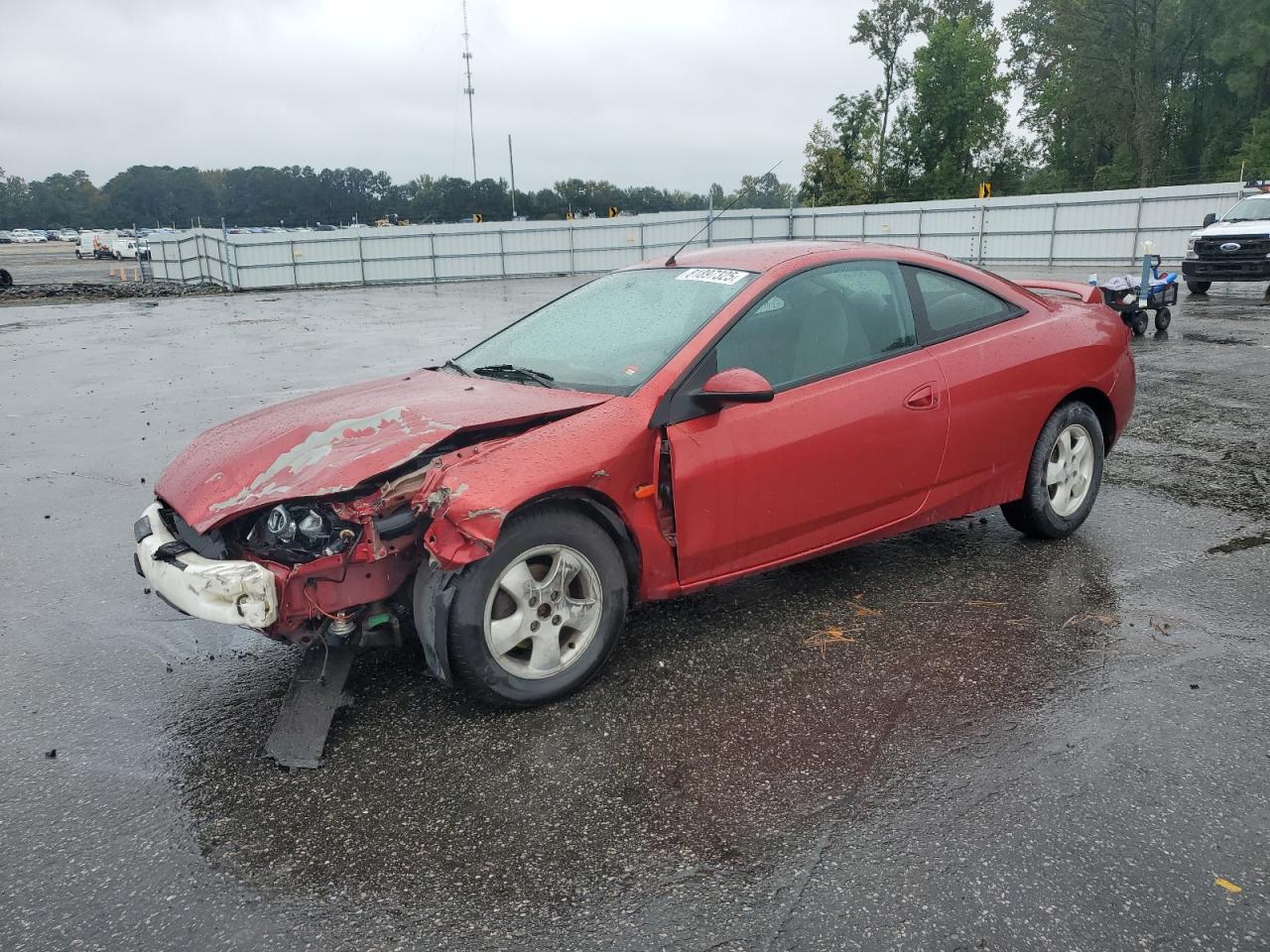 MERCURY COUGAR 2000. Lot# 81897325. VIN 1ZWFT6033Y5612487. Photo 1