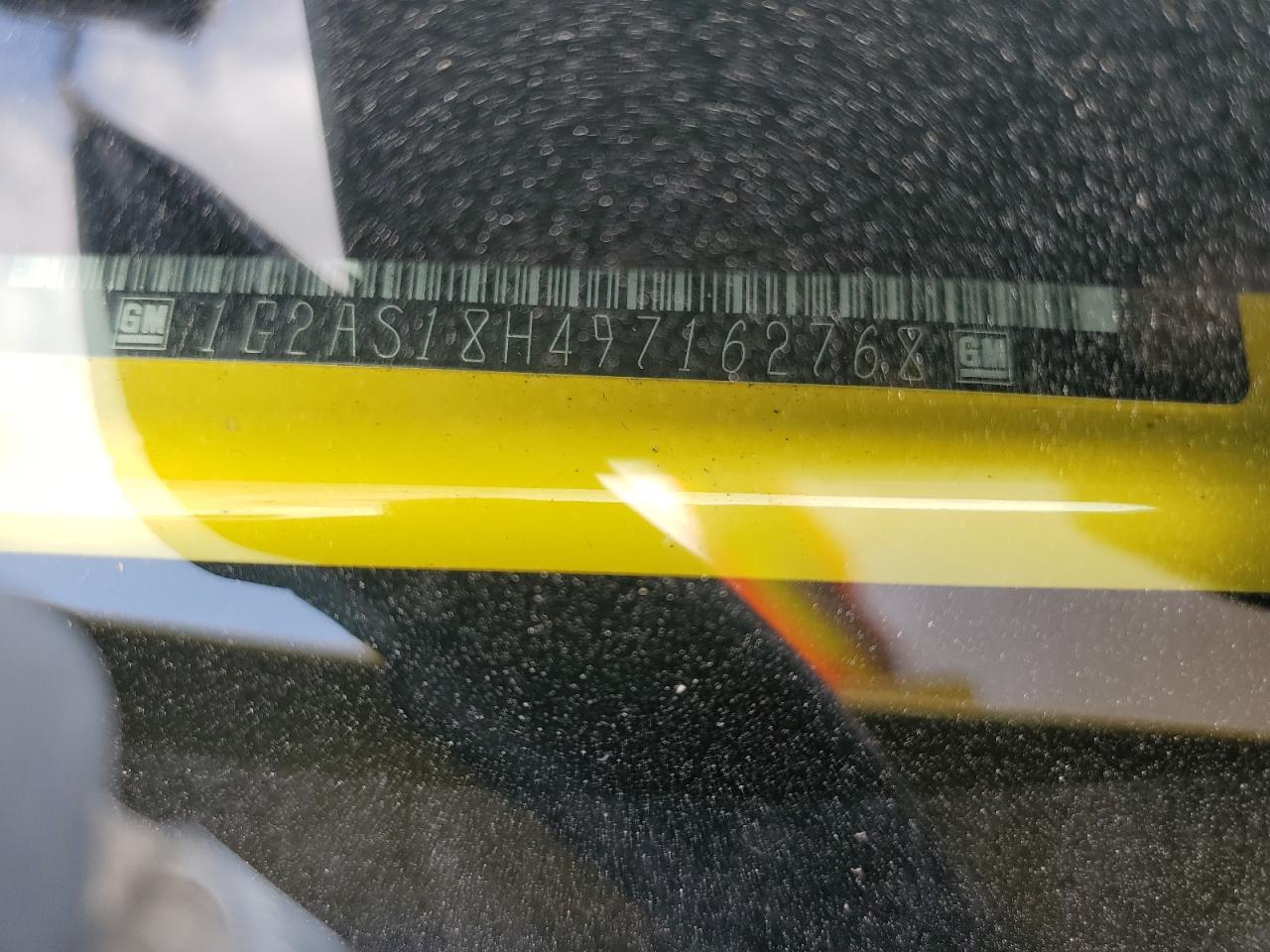 2009 Pontiac G5 VIN: 1G2AS18H497162768 Lot: 70945695