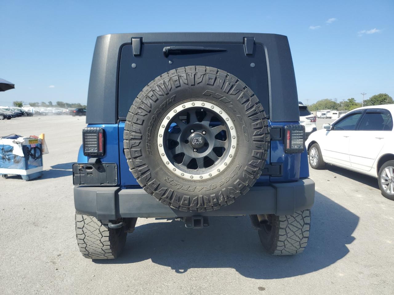 2009 Jeep Wrangler Unlimited Sahara VIN: 1J4GA59169L770214 Lot: 81599695