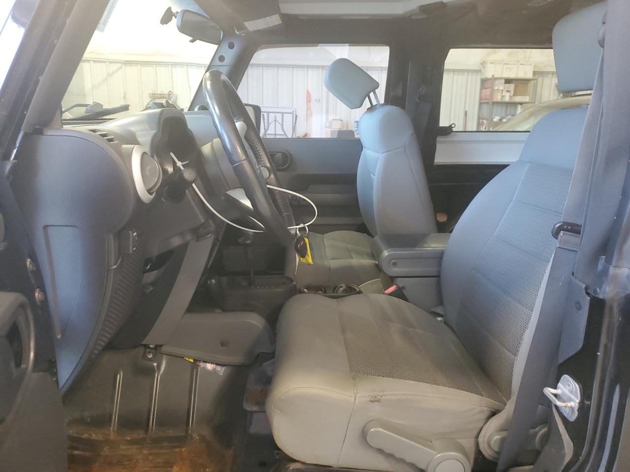 2009 Jeep Wrangler Sahara VIN: 1J8FA541X9L715587 Lot: 70871185