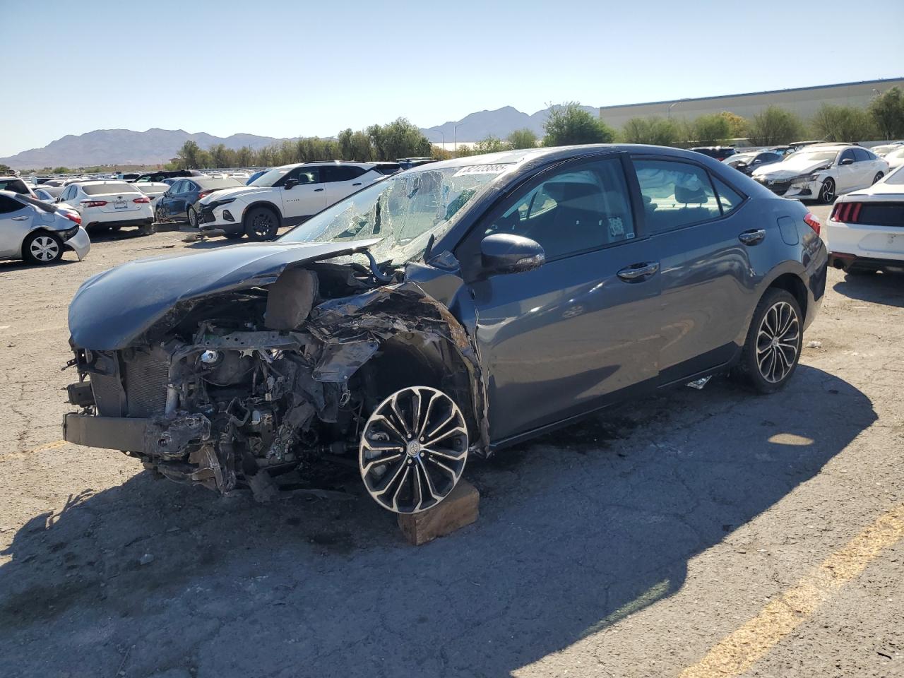 2016 Toyota Corolla L charcoal null gas 5YFBURHEXGP485751 photo #1