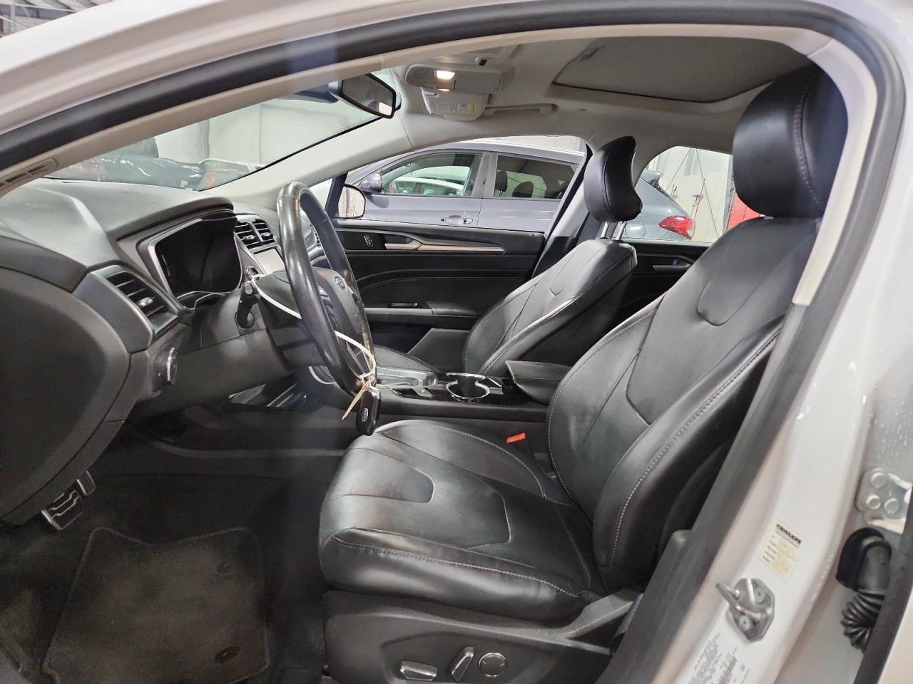 2015 Ford Fusion Titanium Phev VIN: 3FA6P0SU8FR280559 Lot: 70739355