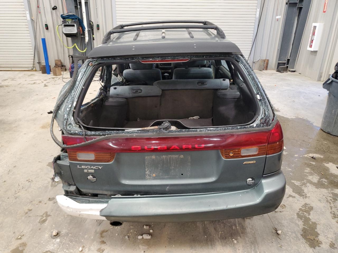 1996 Subaru Legacy L VIN: 4S3BK4352T7302077 Lot: 81431275
