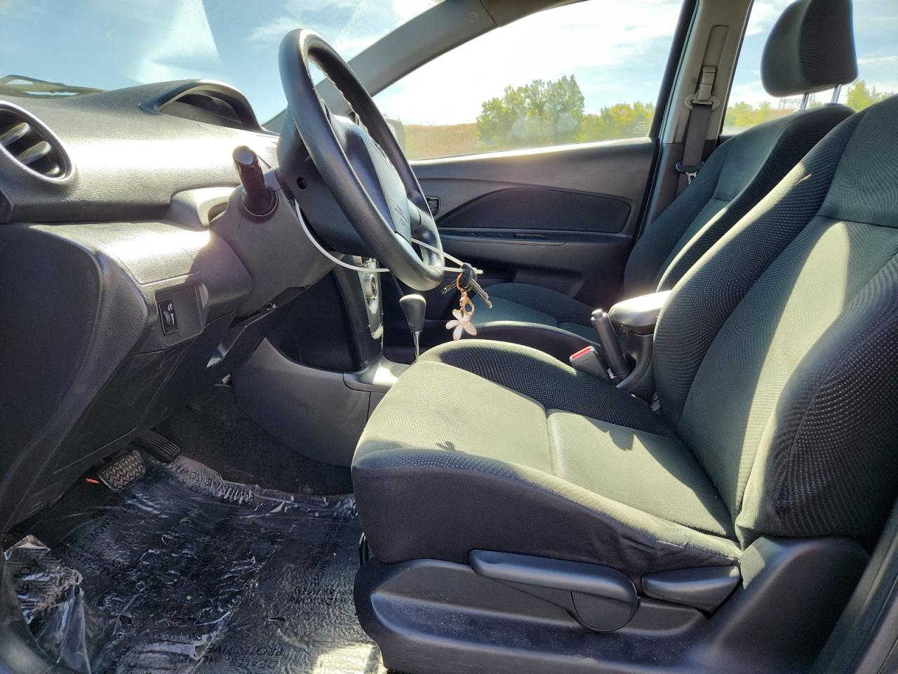 2009 Toyota Yaris VIN: JTDBT903X91346207 Lot: 81312075