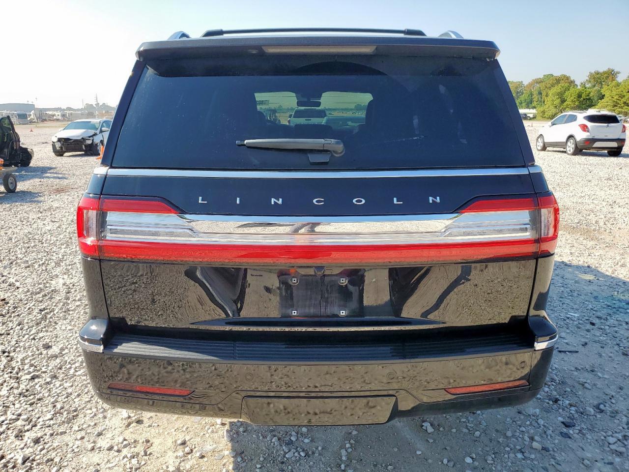 2021 Lincoln Navigator L Reserve VIN: 5LMJJ3LT0MEL03841 Lot: 80205945