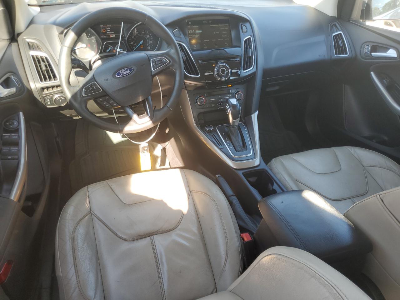 2016 Ford Focus Titanium VIN: 1FADP3N27GL346036 Lot: 81180405