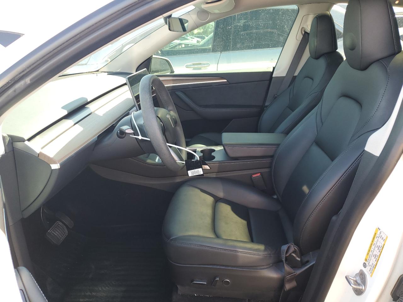 2023 Tesla Model Y VIN: 7SAYGDEE9PF688489 Lot: 82122015