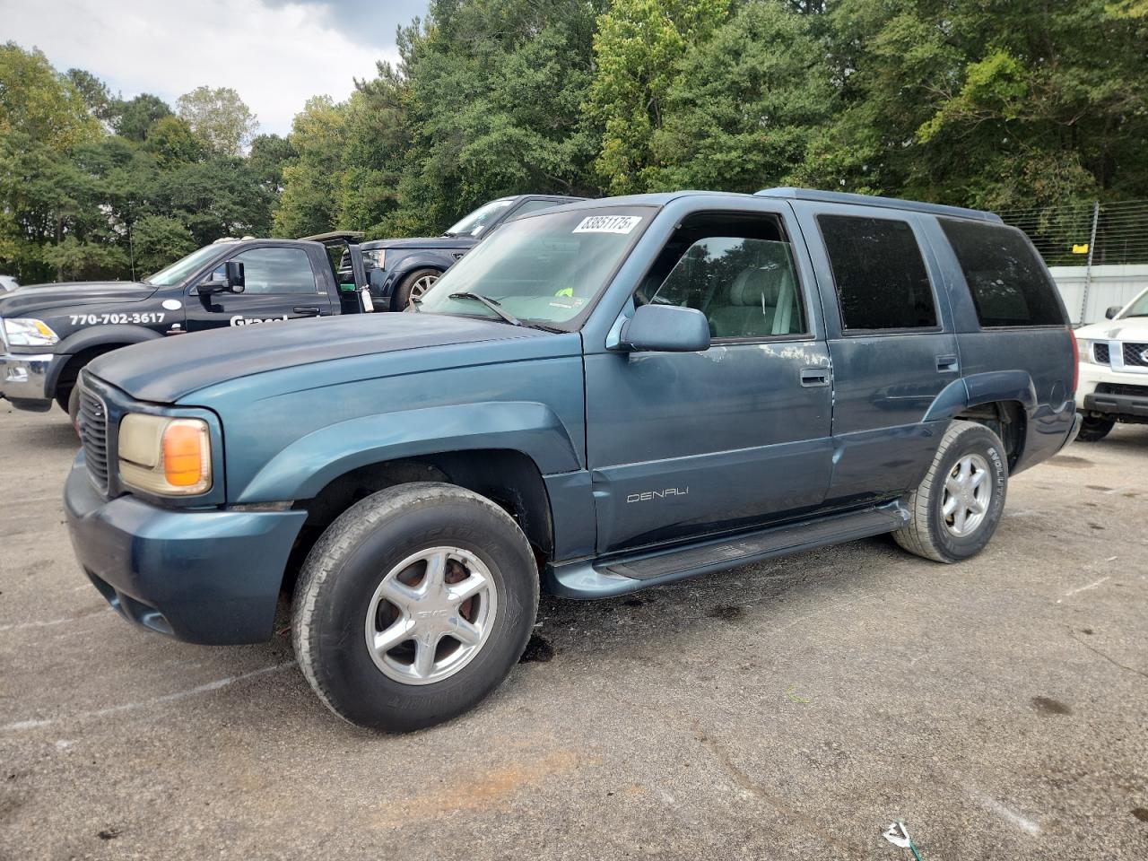 GMC DENALI 1999. Lot# 83851175. VIN 1GKEK13R7XR916474. Photo 1