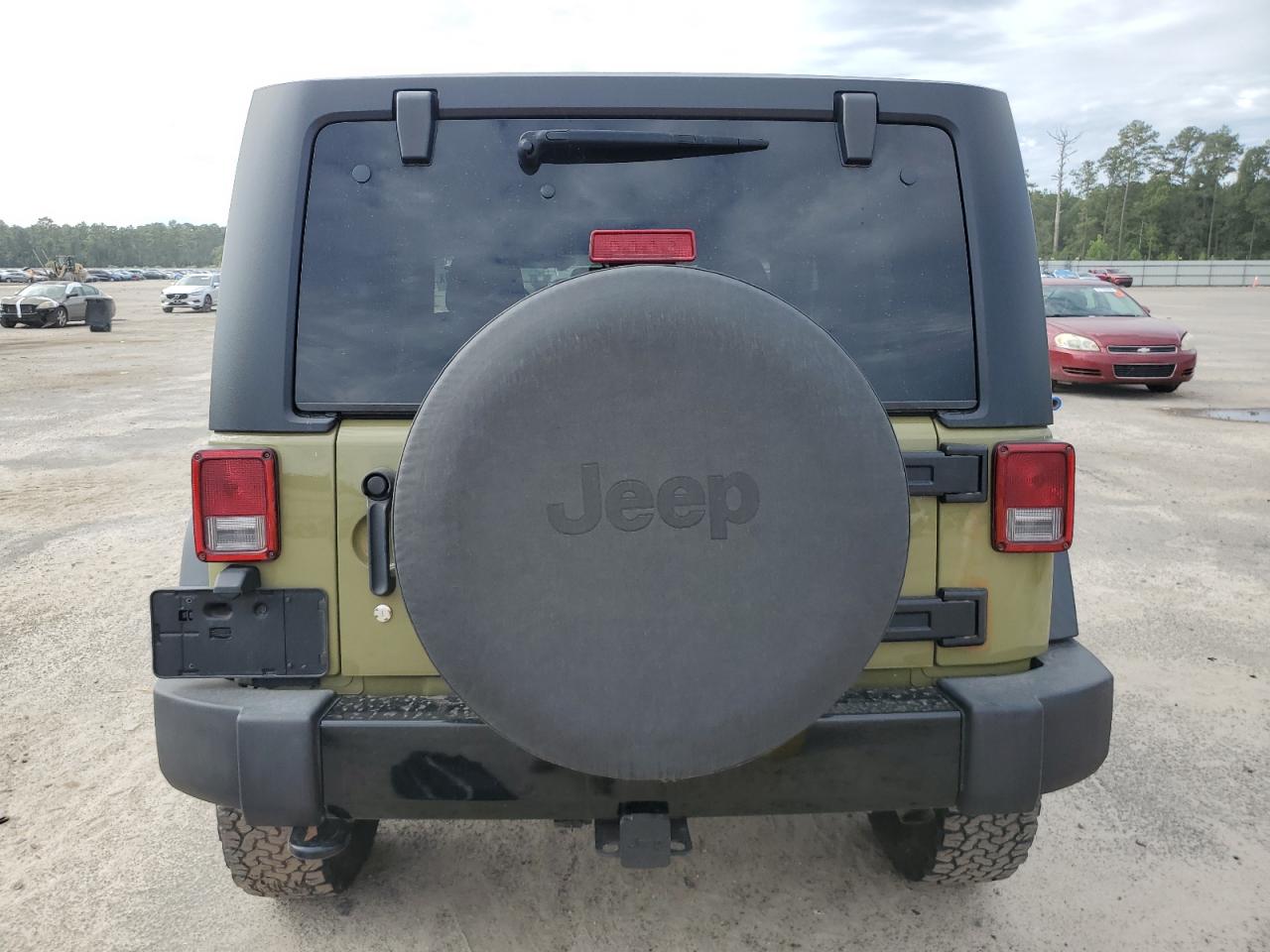 2013 Jeep Wrangler Sport VIN: 1C4GJWAGXDL702034 Lot: 81456445