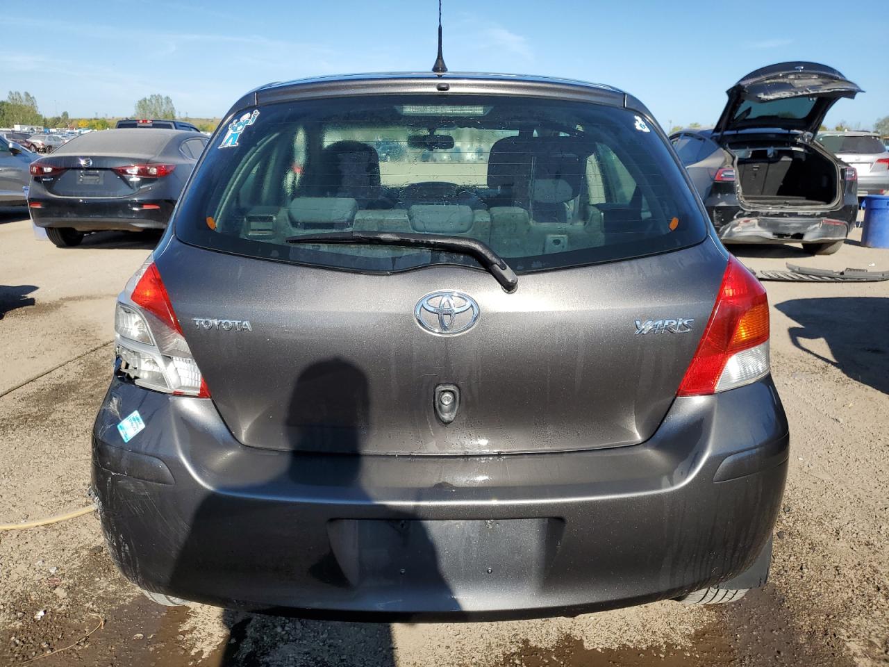 2010 Toyota Yaris VIN: JTDKT9K34A5296561 Lot: 80201985