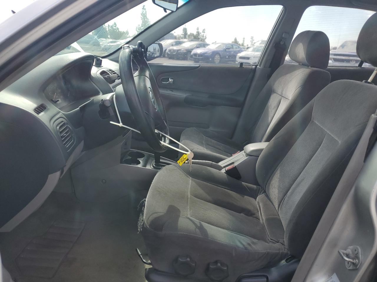 2002 Mazda Protege Dx VIN: JM1BJ225221617049 Lot: 82103005