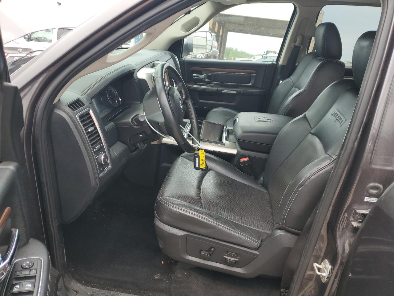 2015 Ram 1500 Laramie VIN: 1C6RR7VM0FS524691 Lot: 71960325