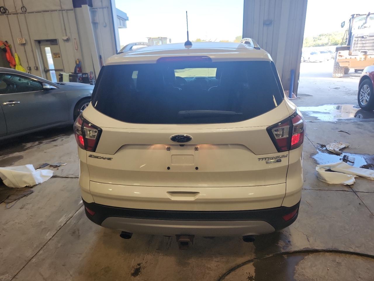 2017 Ford Escape Titanium VIN: 1FMCU9J90HUA46981 Lot: 81252645