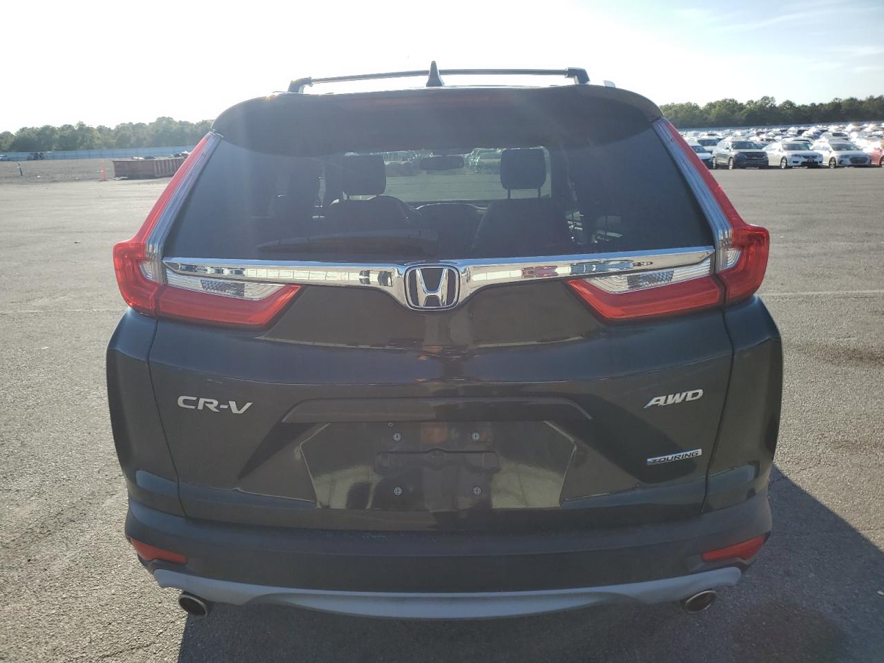 2017 Honda Cr-V Touring VIN: 5J6RW2H93HL009901 Lot: 81667175