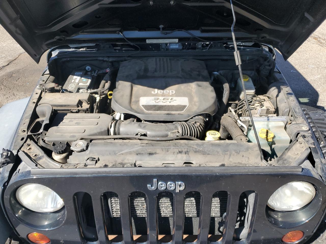 2012 Jeep Wrangler Unlimited Sport VIN: 1C4BJWDG6CL215210 Lot: 81741915