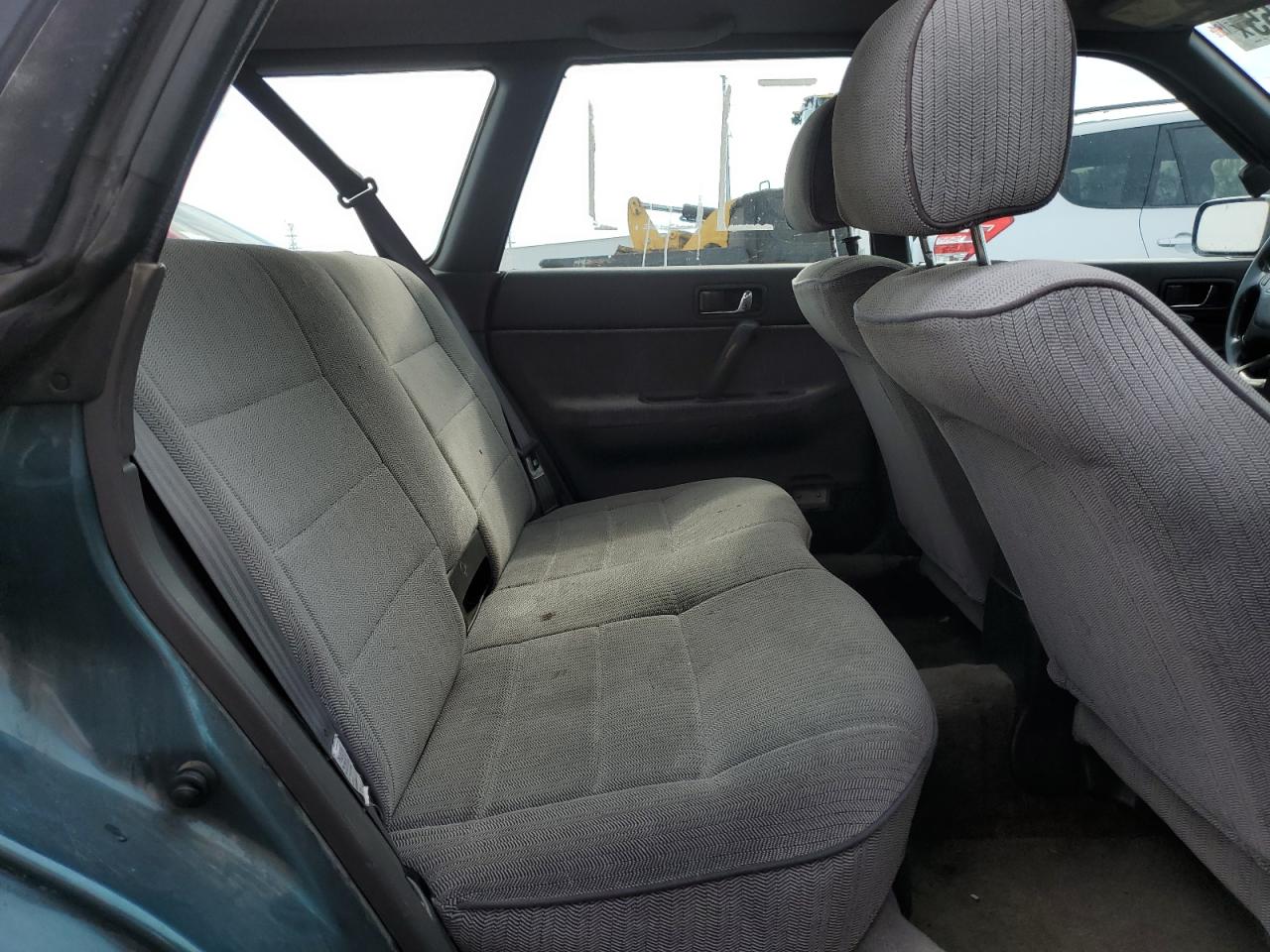 1994 Subaru Legacy L VIN: 4S3BJ6336R9941203 Lot: 81621065