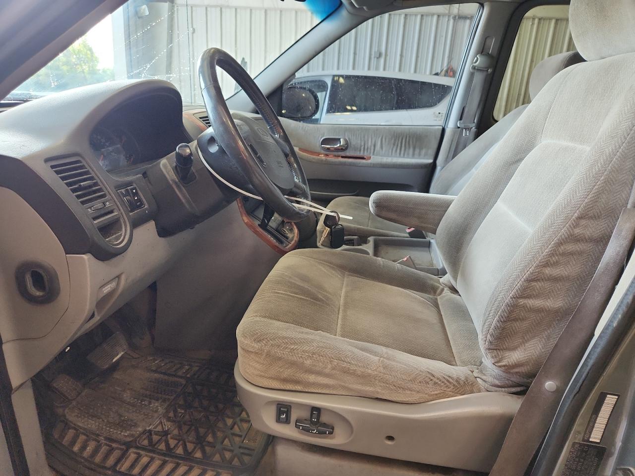 2005 Kia Sedona Ex VIN: KNDUP131056614039 Lot: 71895885