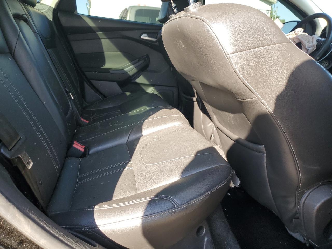 2014 Ford Focus Titanium VIN: 1FADP3J20EL253412 Lot: 83834645