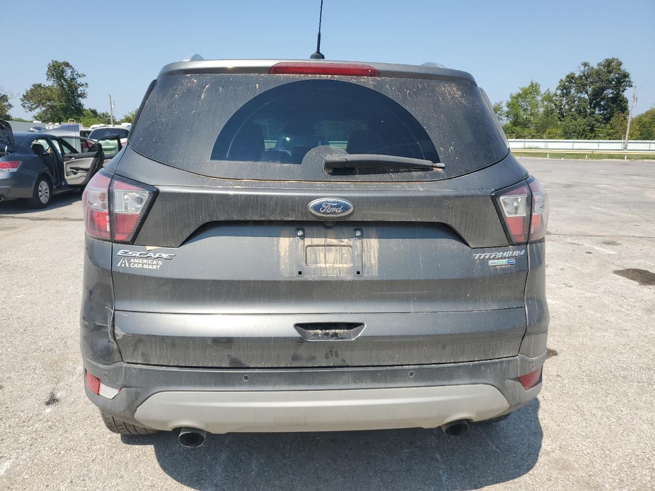 2017 Ford Escape Titanium VIN: 1FMCU9J9XHUA98506 Lot: 80702425