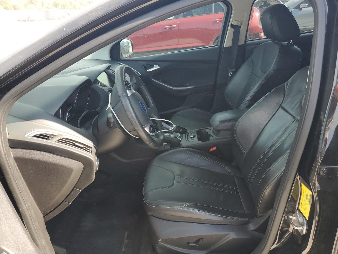 2014 Ford Focus Titanium VIN: 1FADP3N28EL458678 Lot: 81481595