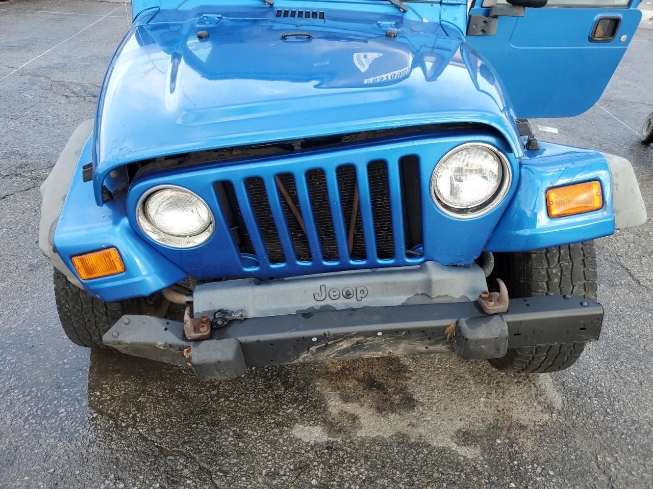 2003 Jeep Wrangler Commando VIN: 1J4FA39S83P301277 Lot: 83789295