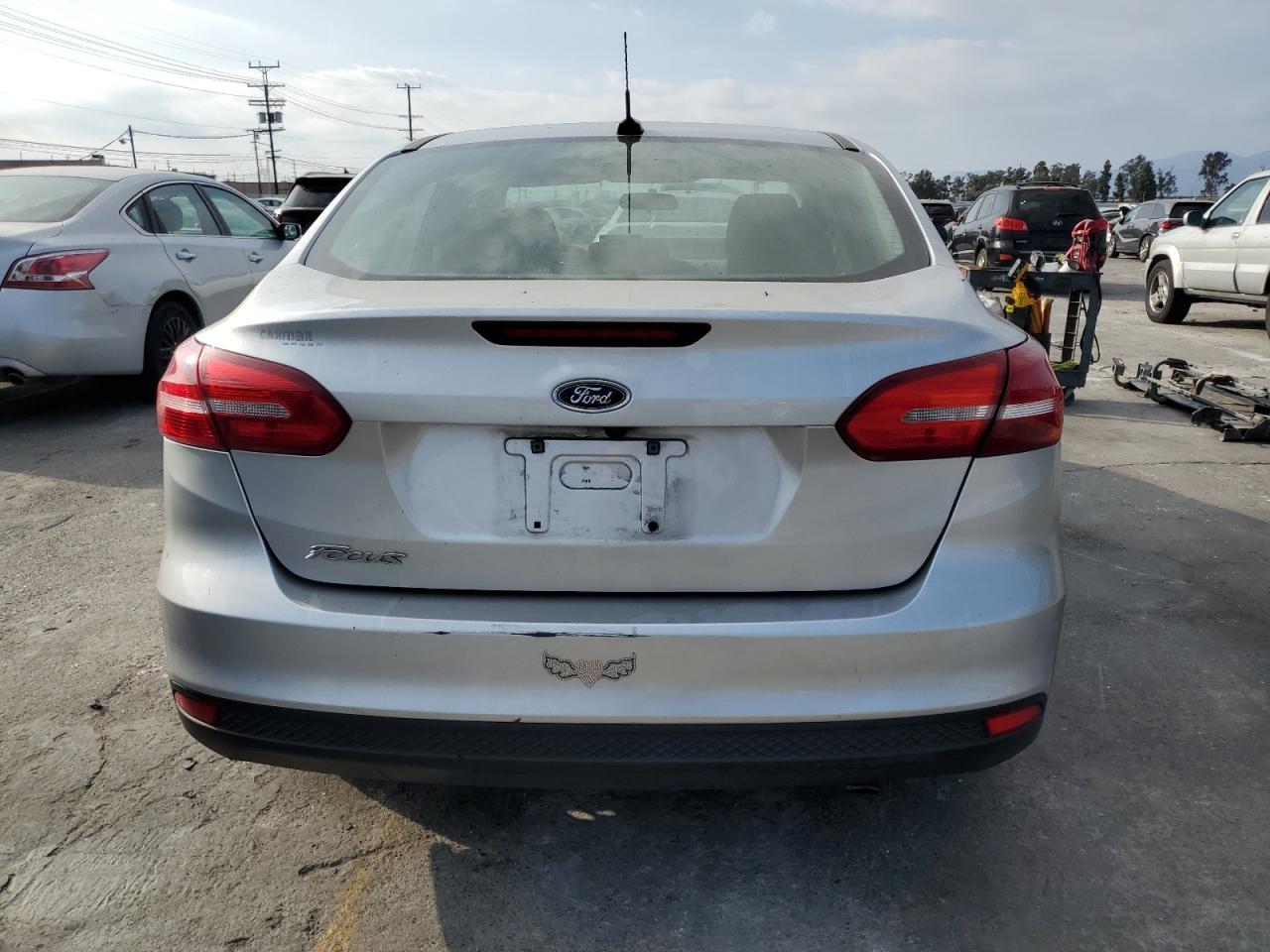 2017 Ford Focus S VIN: 1FADP3E21HL263932 Lot: 80700175