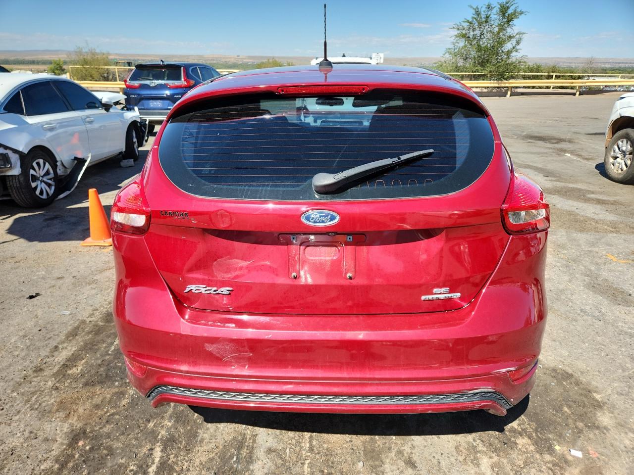 2016 Ford Focus Se VIN: 1FADP3K27GL306026 Lot: 71700515
