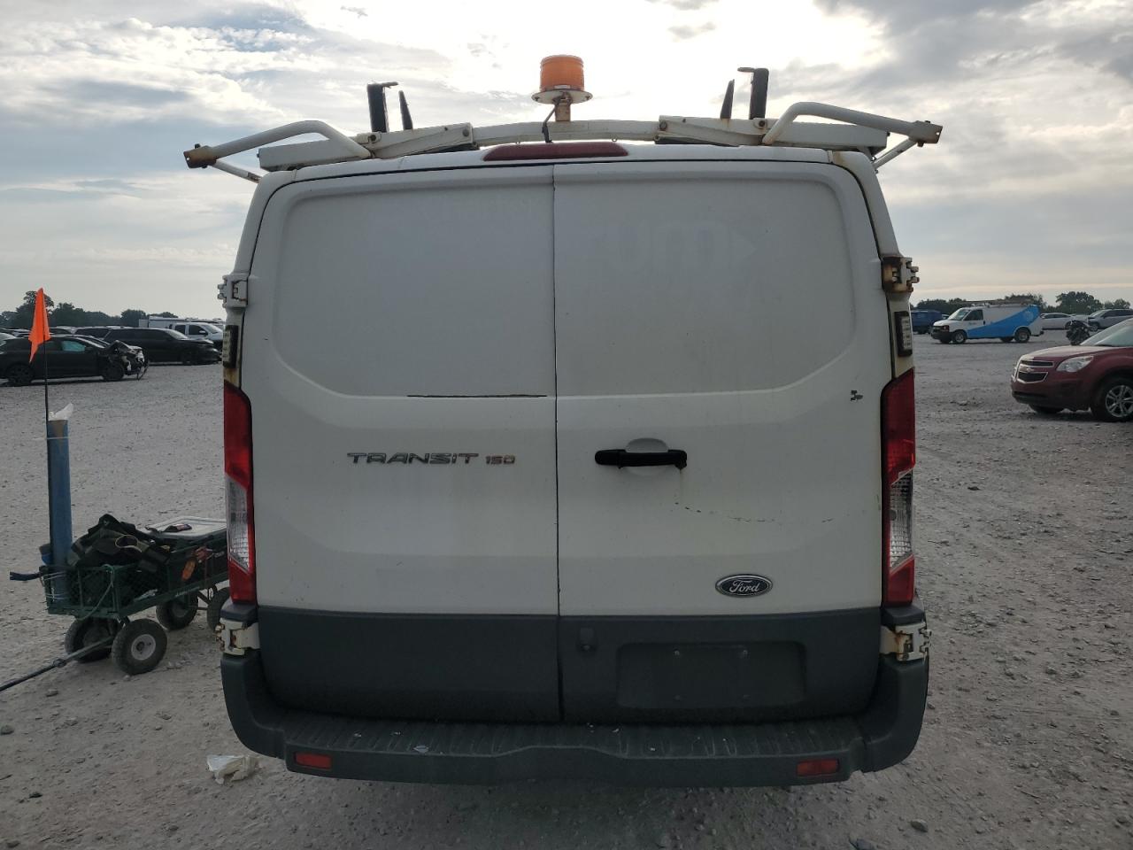 2015 Ford Transit T-150 VIN: 1FTNE1ZM0FKA18370 Lot: 71434955