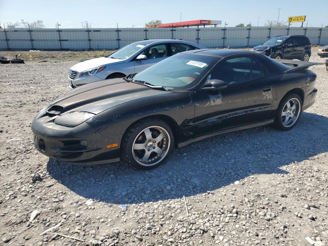 PONTIAC FIREBIRD 1999. Lot# 81828195. VIN 2G2FV22G4X2211605. Photo 1