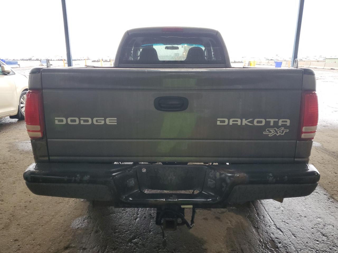 2004 Dodge Dakota Sxt VIN: 1D7HG12K44S556475 Lot: 82159875