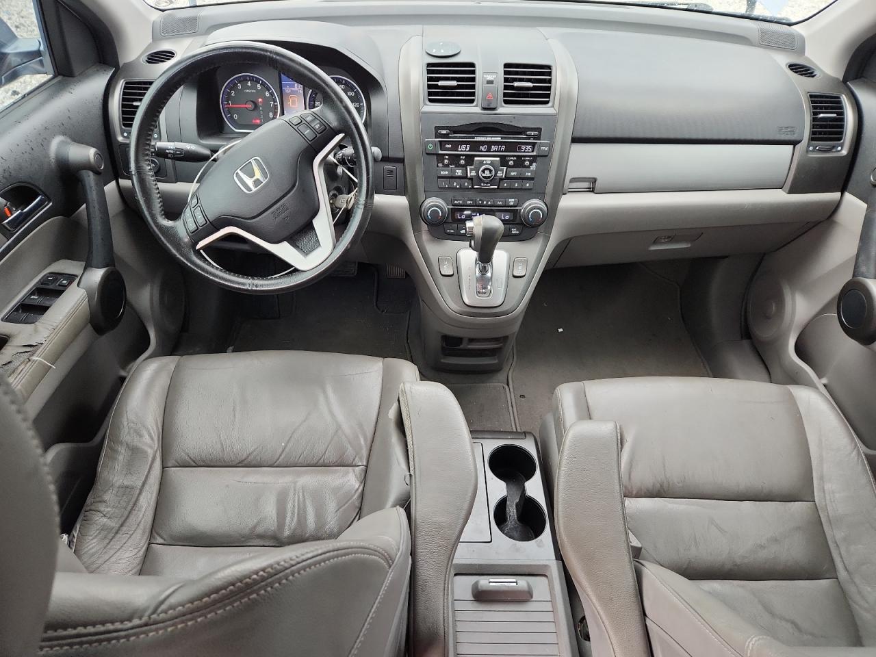 2010 Honda Cr-V Exl VIN: JHLRE4H79AC002303 Lot: 81606895