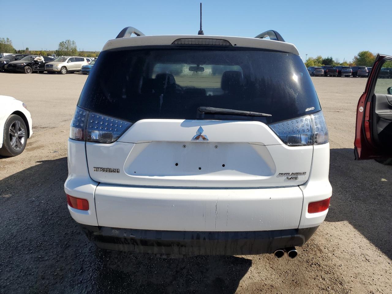 2010 Mitsubishi Outlander Xls VIN: JA4JT3AX8AZ609000 Lot: 83832445