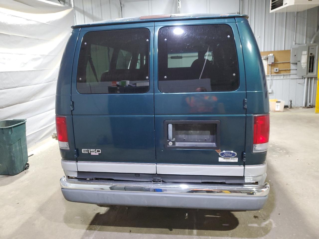 1999 Ford Econoline E150 Wagon VIN: 1FMRE11L0XHA99000 Lot: 80556465