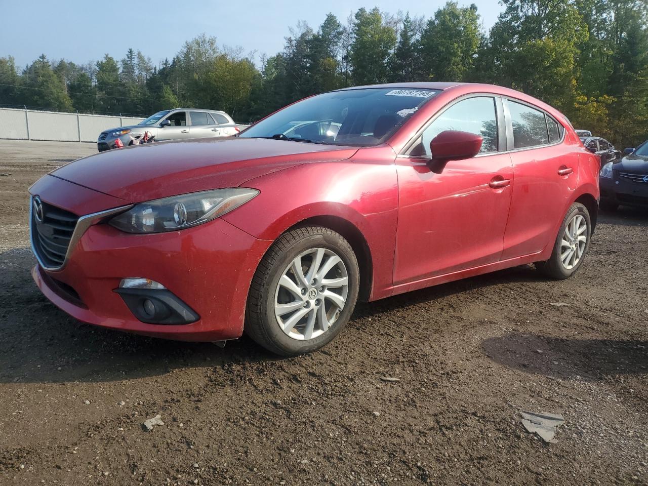 2014 Mazda 3 Touring red hatchback gasoline JM1BM1L79E1134230 photo #1