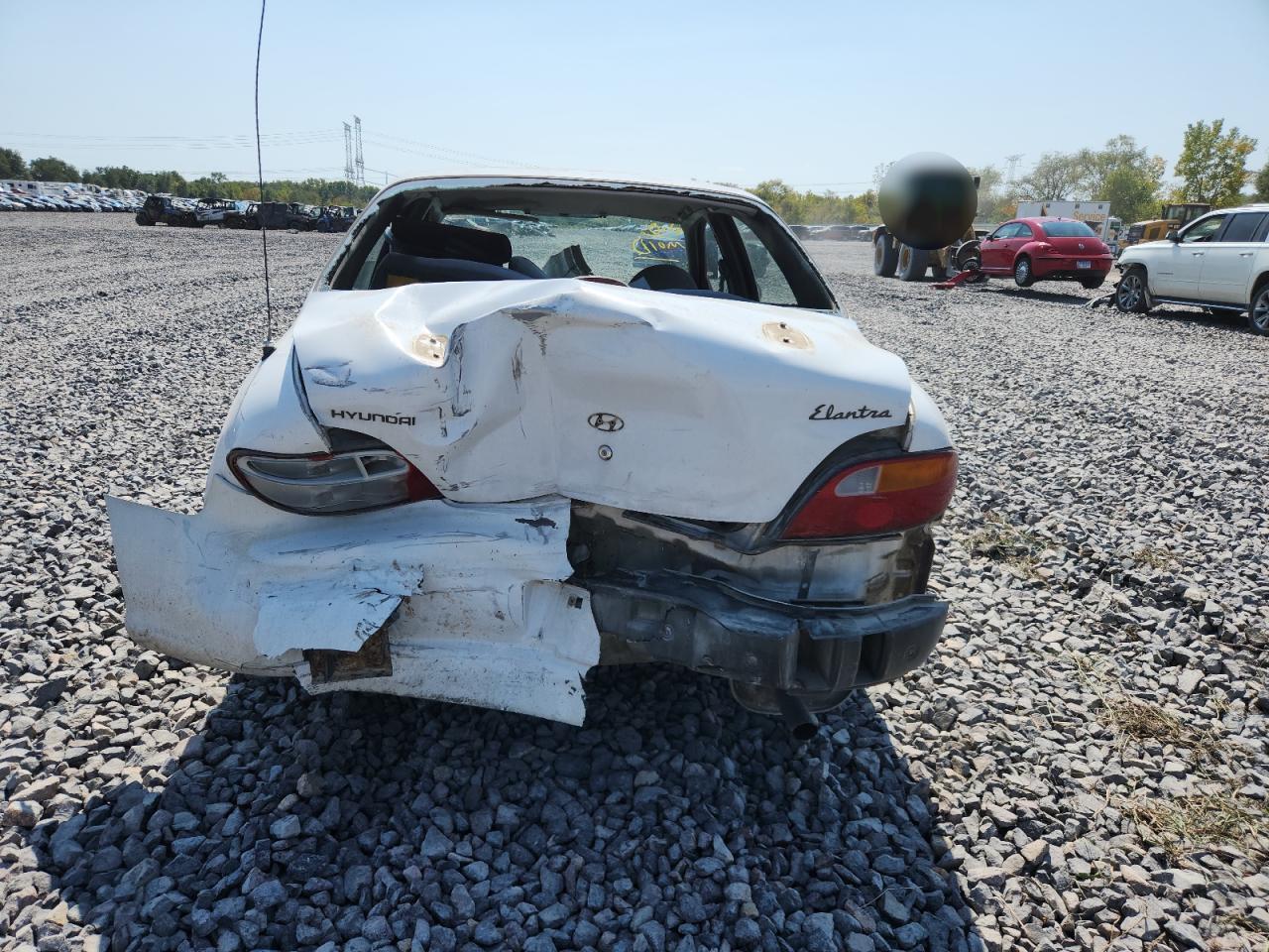 1998 Hyundai Elantra VIN: KMHJF24M9WU661258 Lot: 80200505