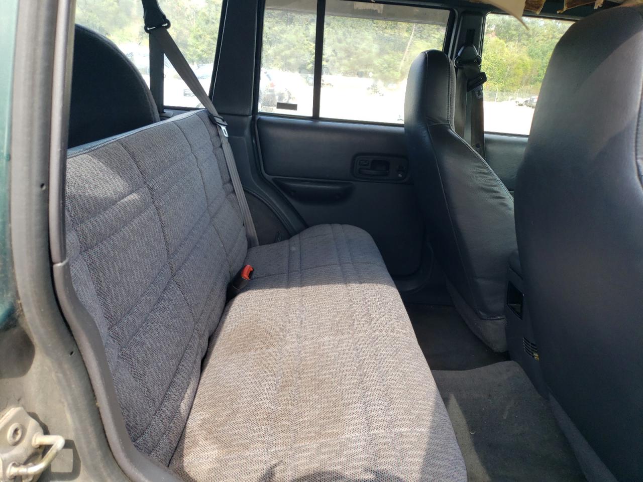 1999 Jeep Cherokee Sport VIN: 1J4FF68S8XL543097 Lot: 82082825