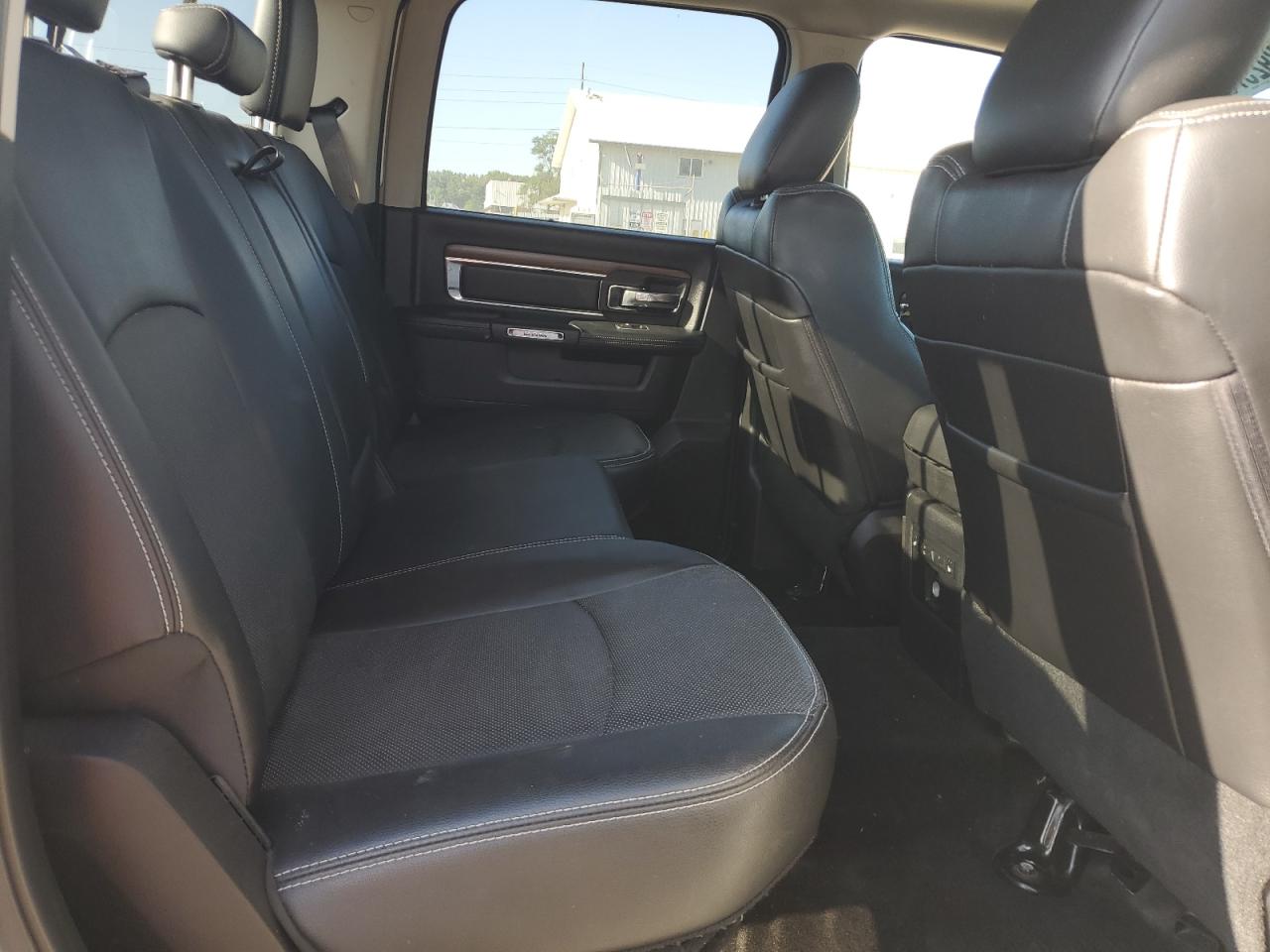 2015 Ram 1500 Laramie VIN: 1C6RR7NT8FS777054 Lot: 84292575