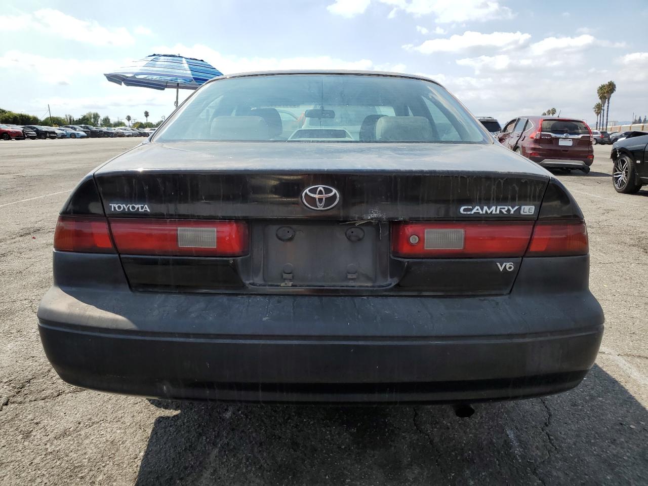 1999 Toyota Camry Le VIN: JT2BF22K4X0177915 Lot: 80576115
