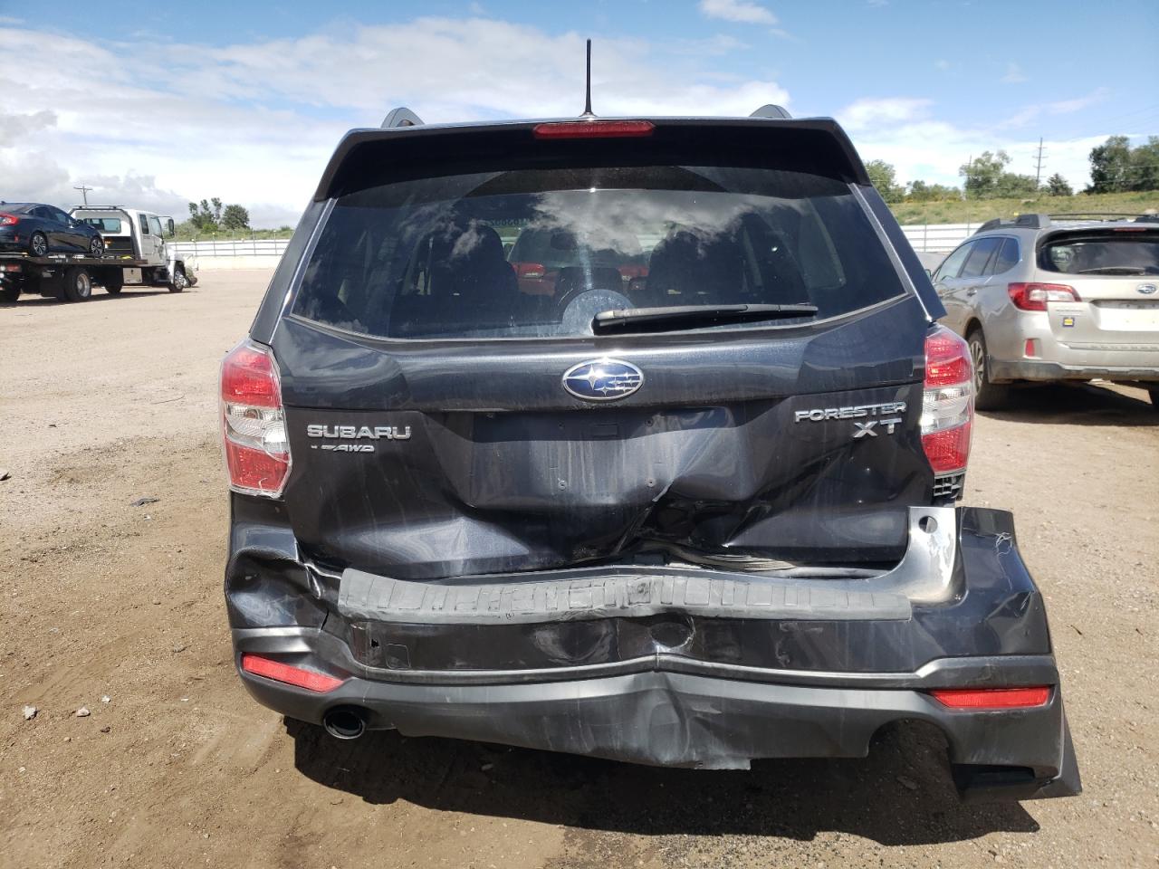 2014 Subaru Forester 2.0Xt Touring VIN: JF2SJGMC8EH521299 Lot: 83852225