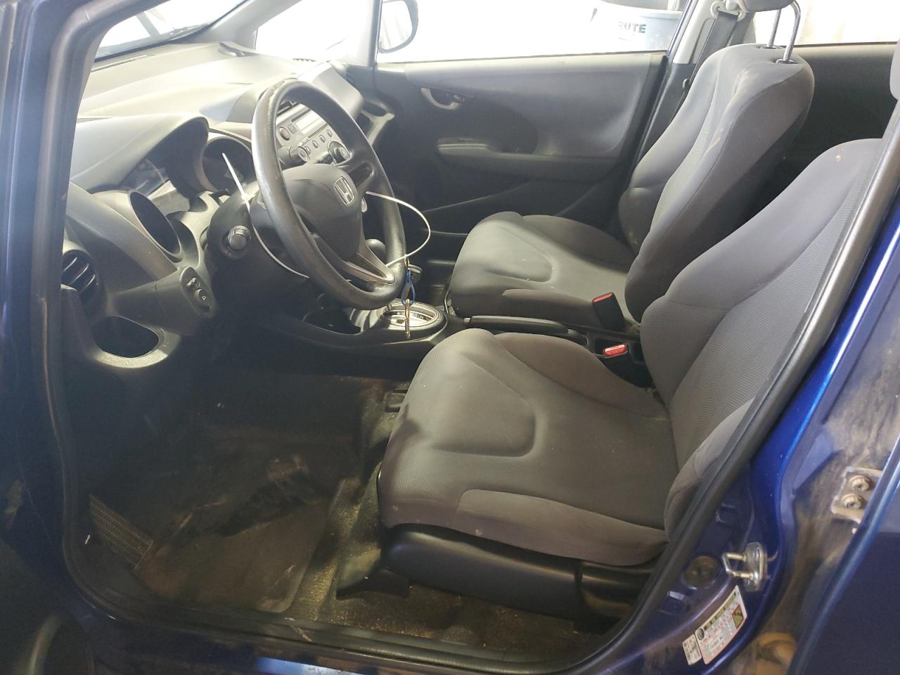 2009 Honda Fit VIN: JHMGE88279S031542 Lot: 82099005