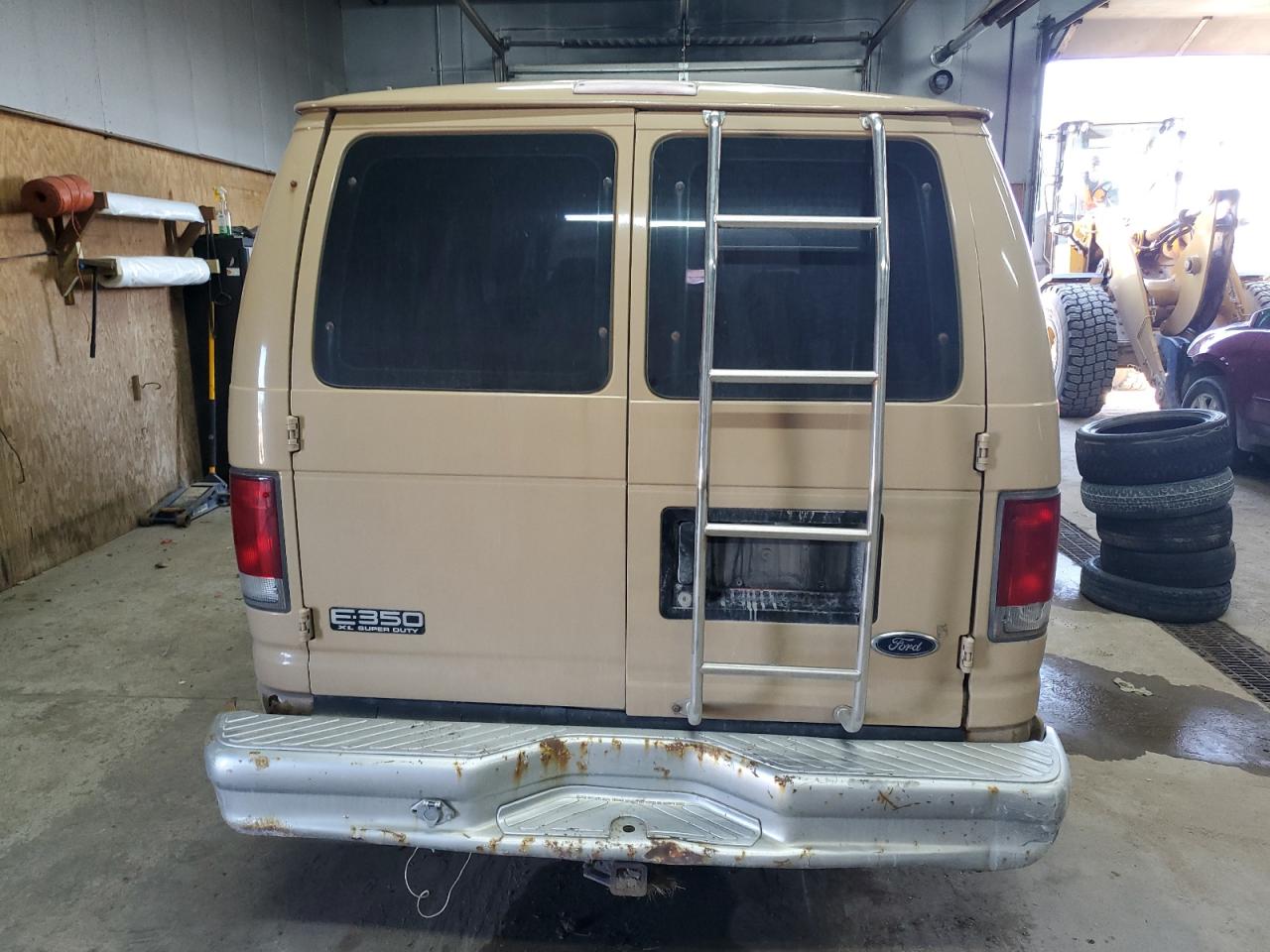 2000 Ford Econoline E350 Super Duty Wagon VIN: 1FBSS31F9YHB27404 Lot: 80470545