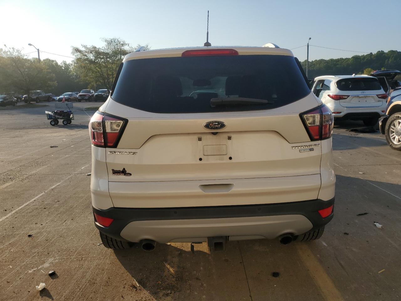 2017 Ford Escape Titanium VIN: 1FMCU9J97HUD74138 Lot: 80317255