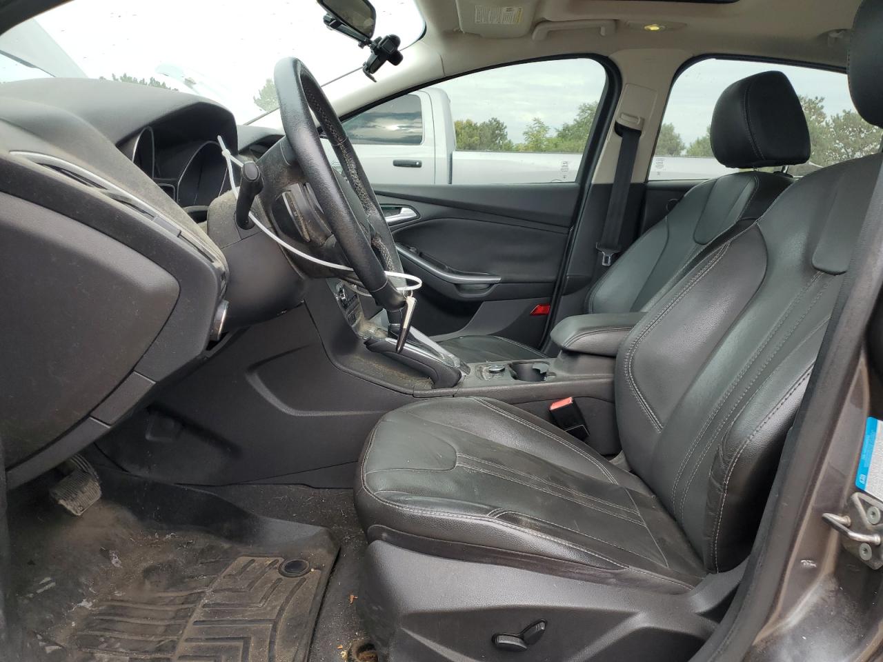 2013 Ford Focus Titanium VIN: 1FADP3N22DL231906 Lot: 81408625