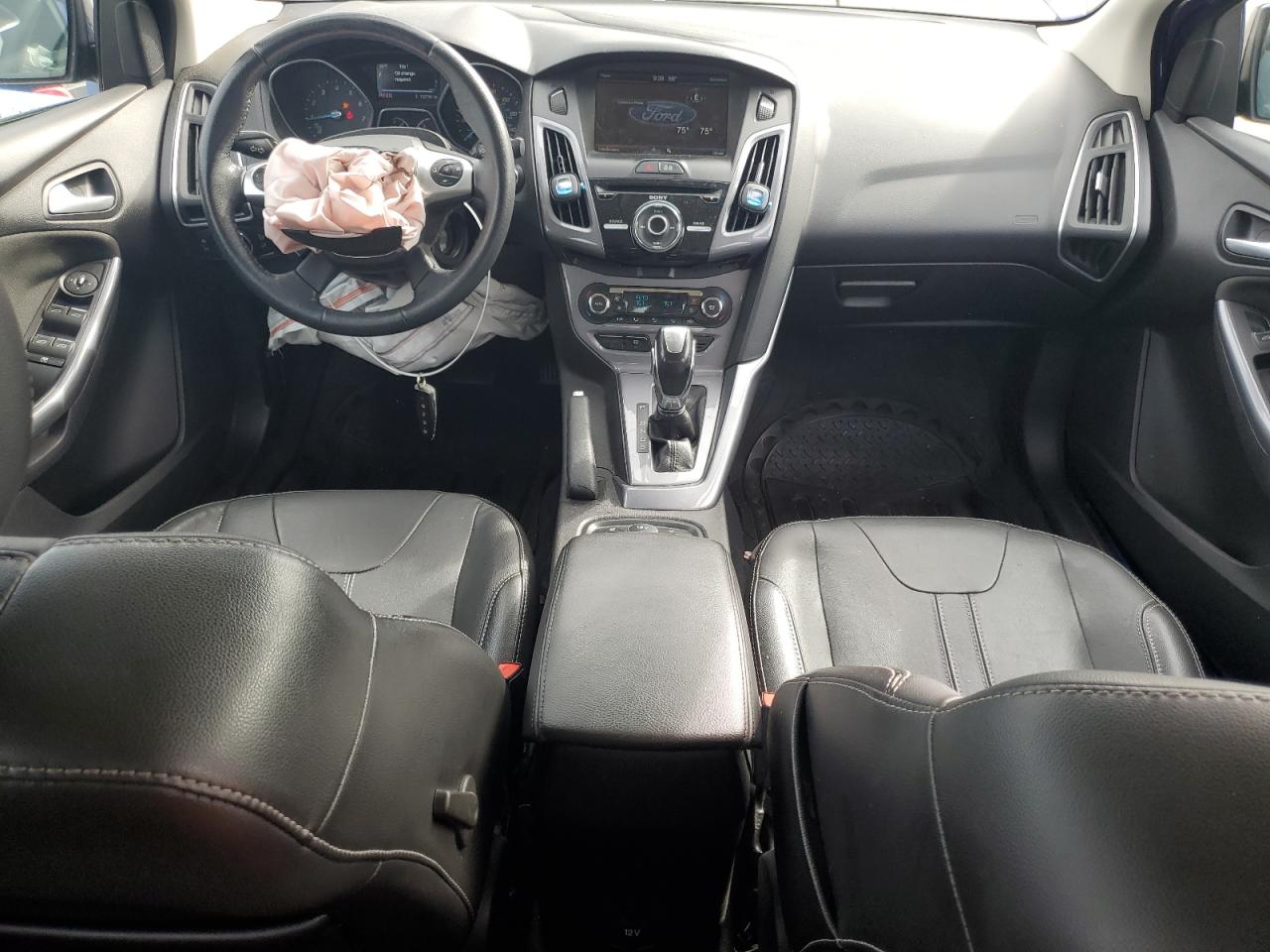 2014 Ford Focus Titanium VIN: 1FADP3J29EL338636 Lot: 71959865