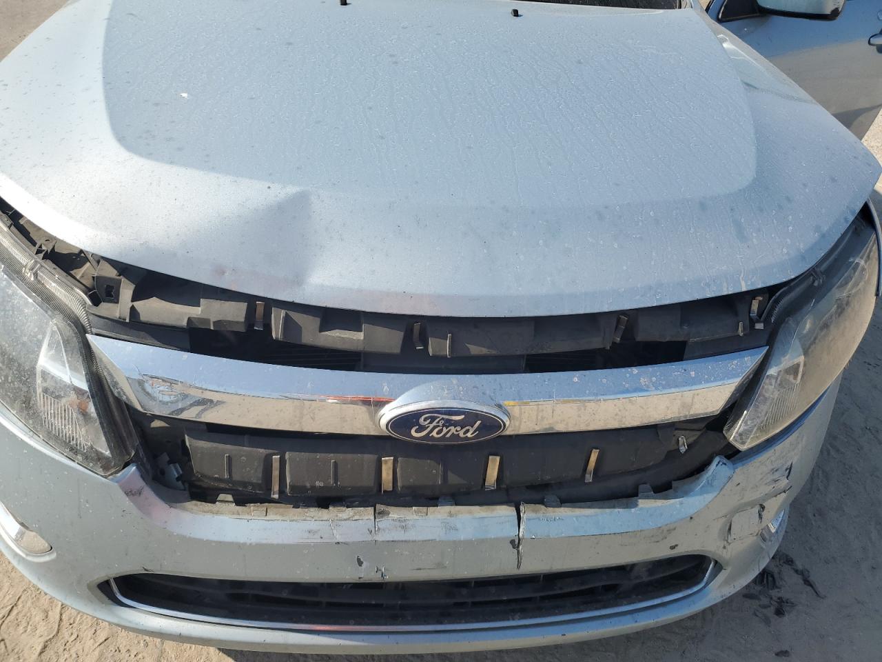 2010 Ford Fusion Hybrid VIN: 3FADP0L35AR303334 Lot: 80543665