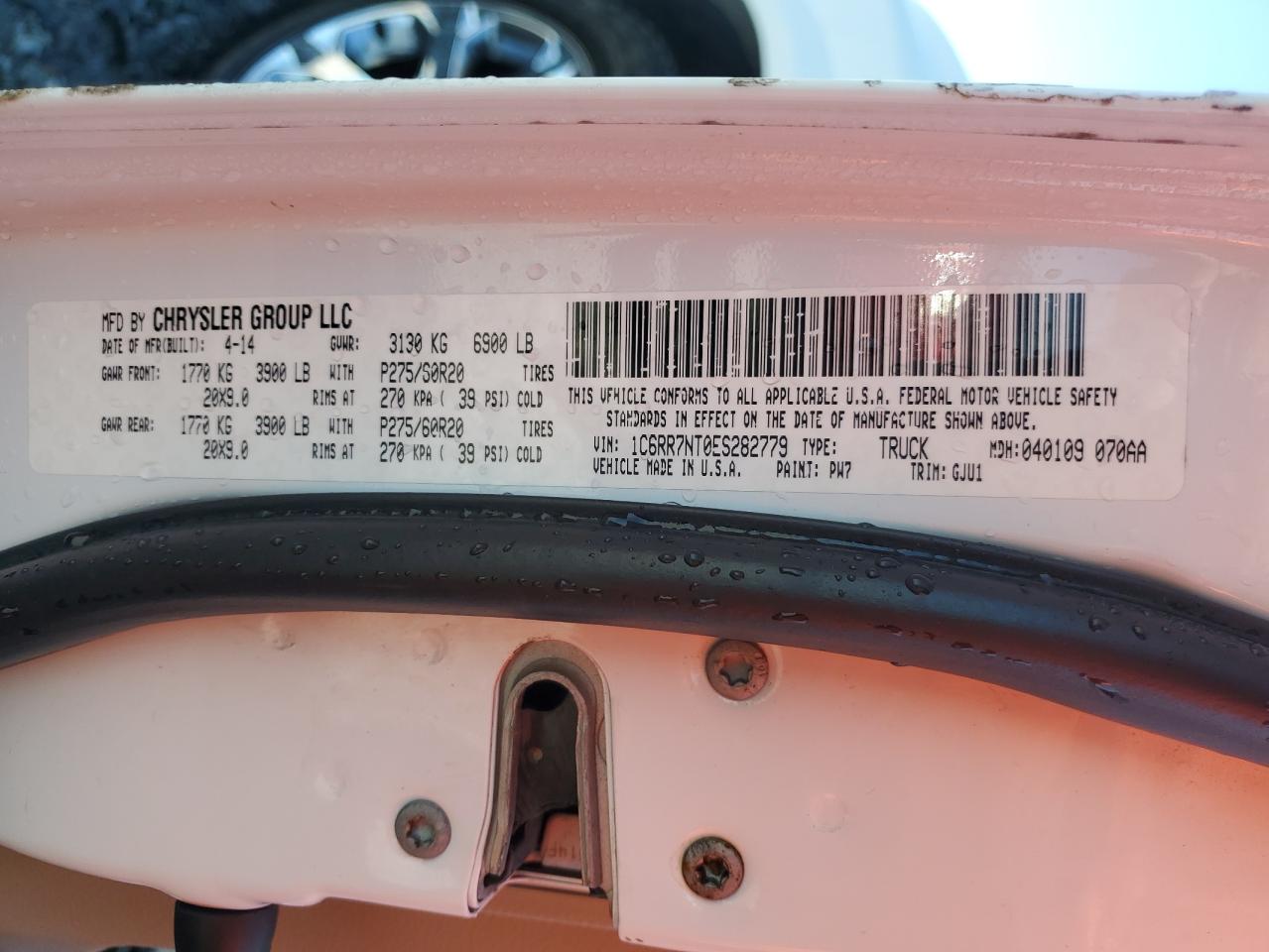 2014 Ram 1500 Laramie VIN: 1C6RR7NT0ES282779 Lot: 83848485