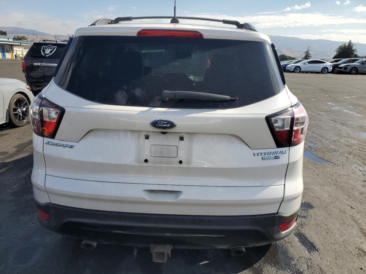 2017 Ford Escape Titanium VIN: 1FMCU9J9XHUE74878 Lot: 81164555